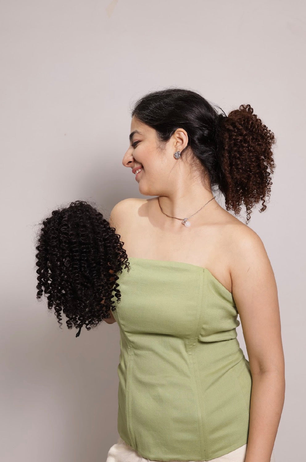 Curly Top Knot Bun